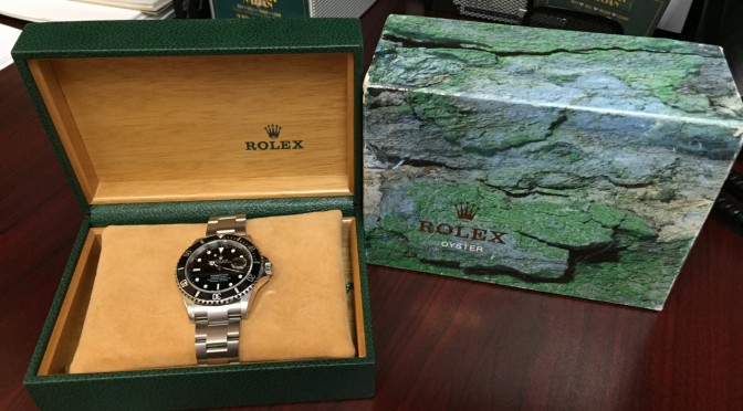 https://www.jewelrynloan.com/blog/rolex-submariner-box-papers